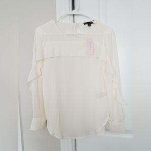 Banana Republic off-white cream long sleeve ruffle blouse.